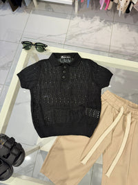 Polo black con bottoni