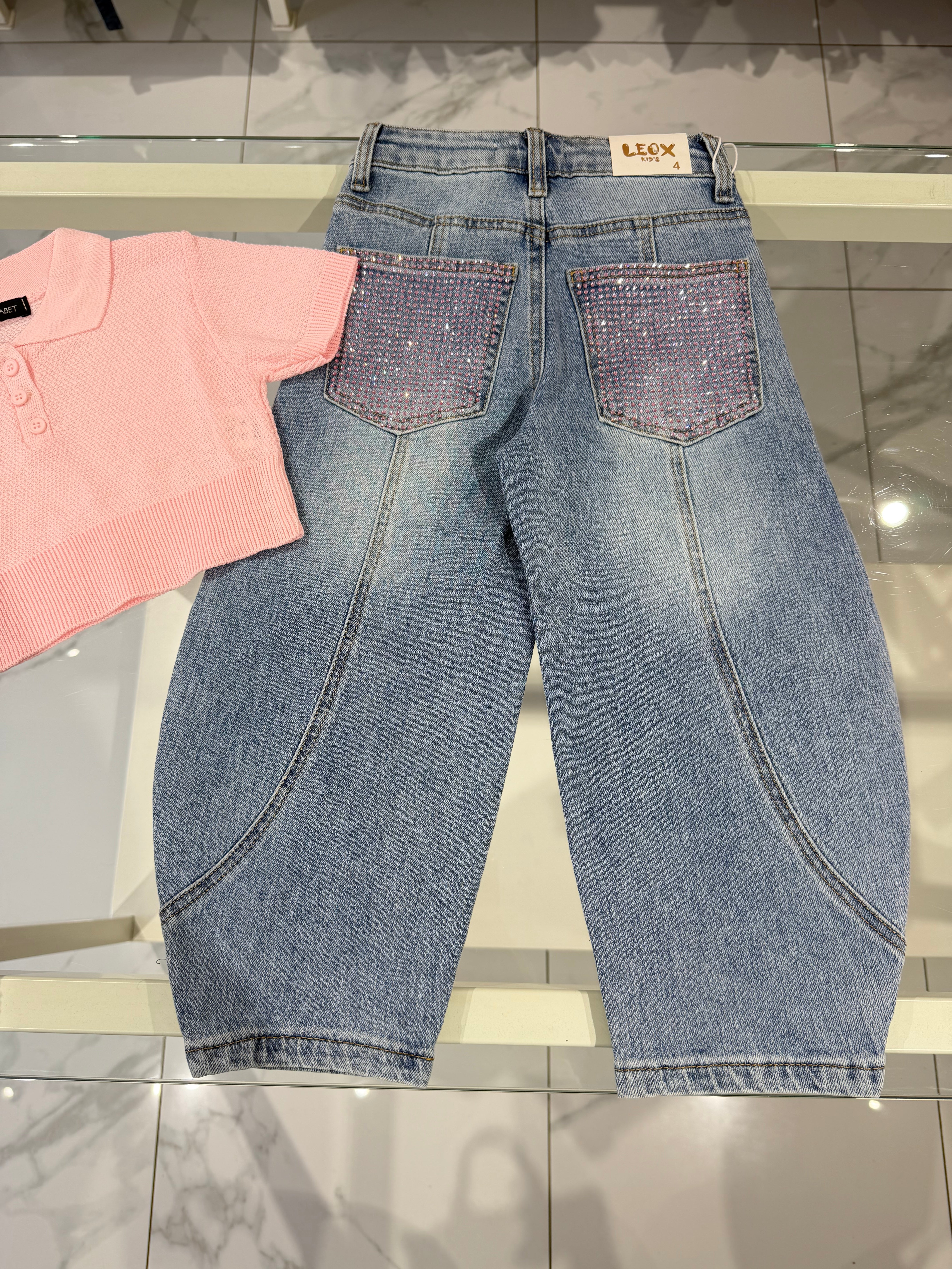 Jeans tasca rosa