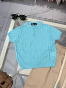 Polo turchese con bottini