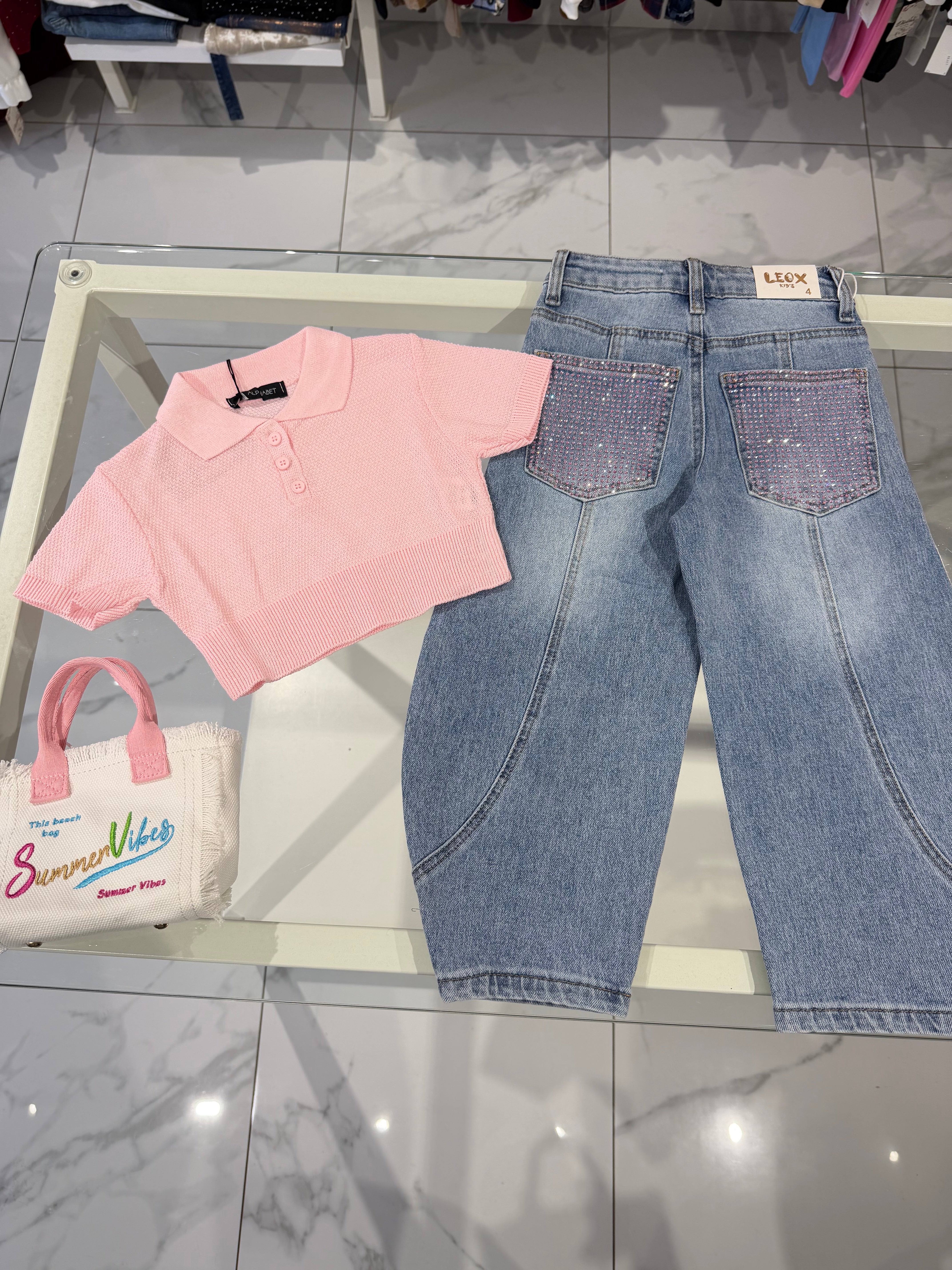Jeans tasca rosa
