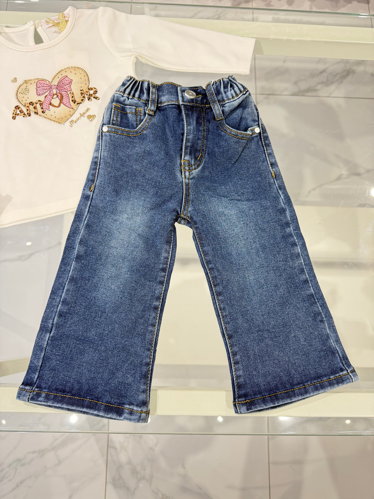 Jeans tasca rosa